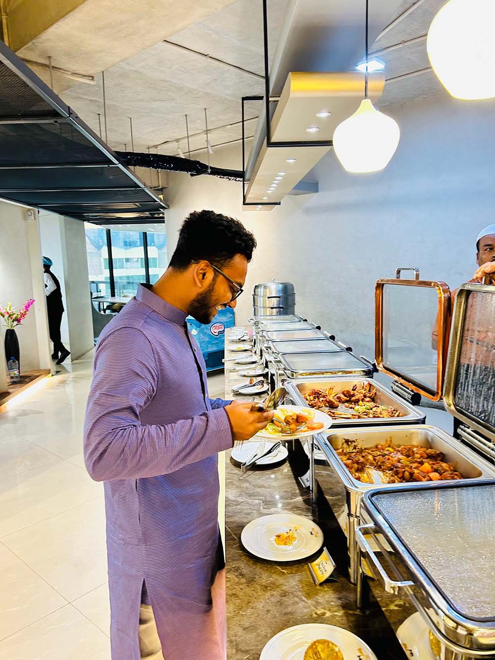 Abid got the boneless piece in the Buffet. How happy he is! 😁